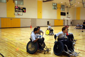 Quadriplegics playing Wheel Chair Rugby.